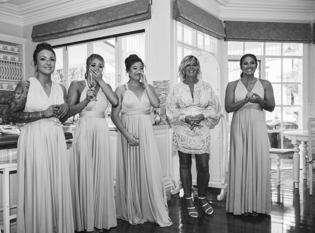 Reveal with bridesmaids before Acacia Ridge wedding