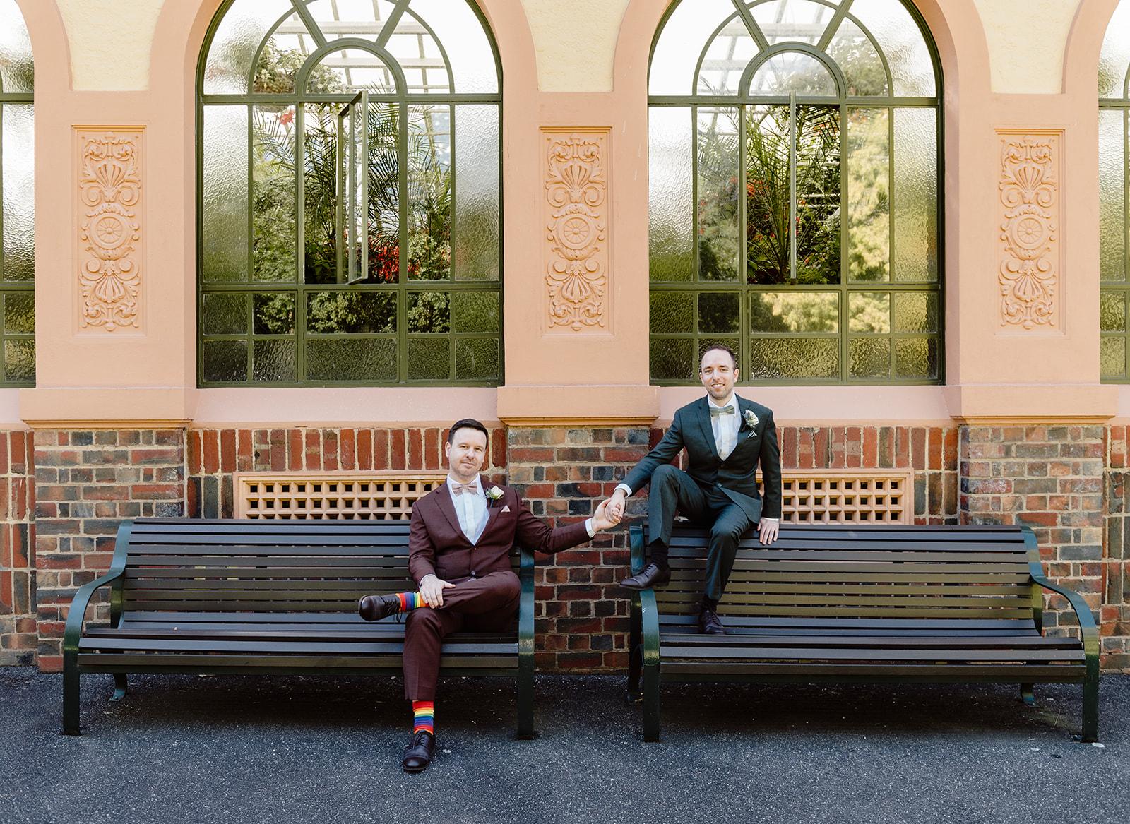 Grooms outside the conservatory in the Fitzroy Gardens