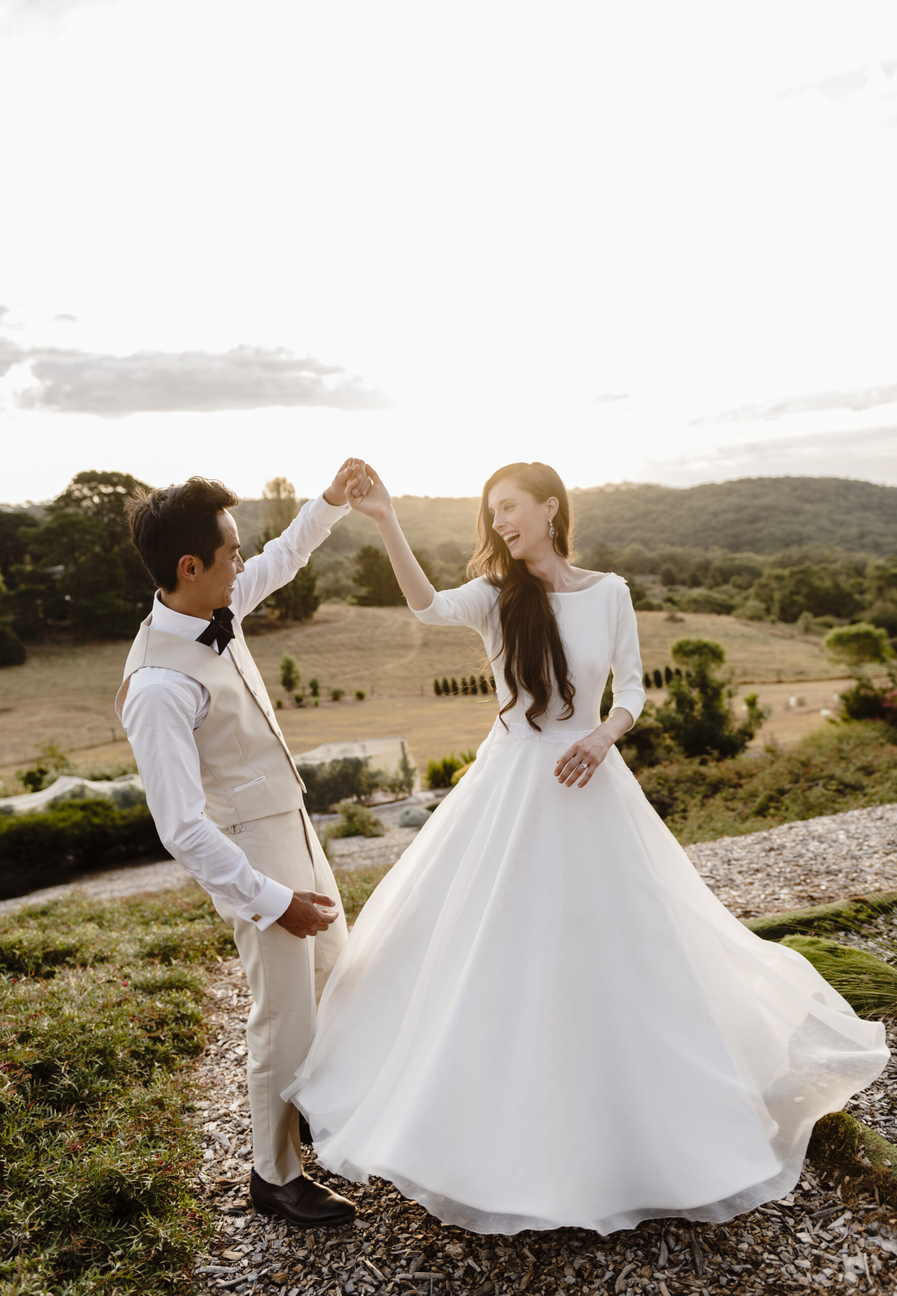 Bride and groom dance at sunset at their private property wedding on the Mornington Peninsula