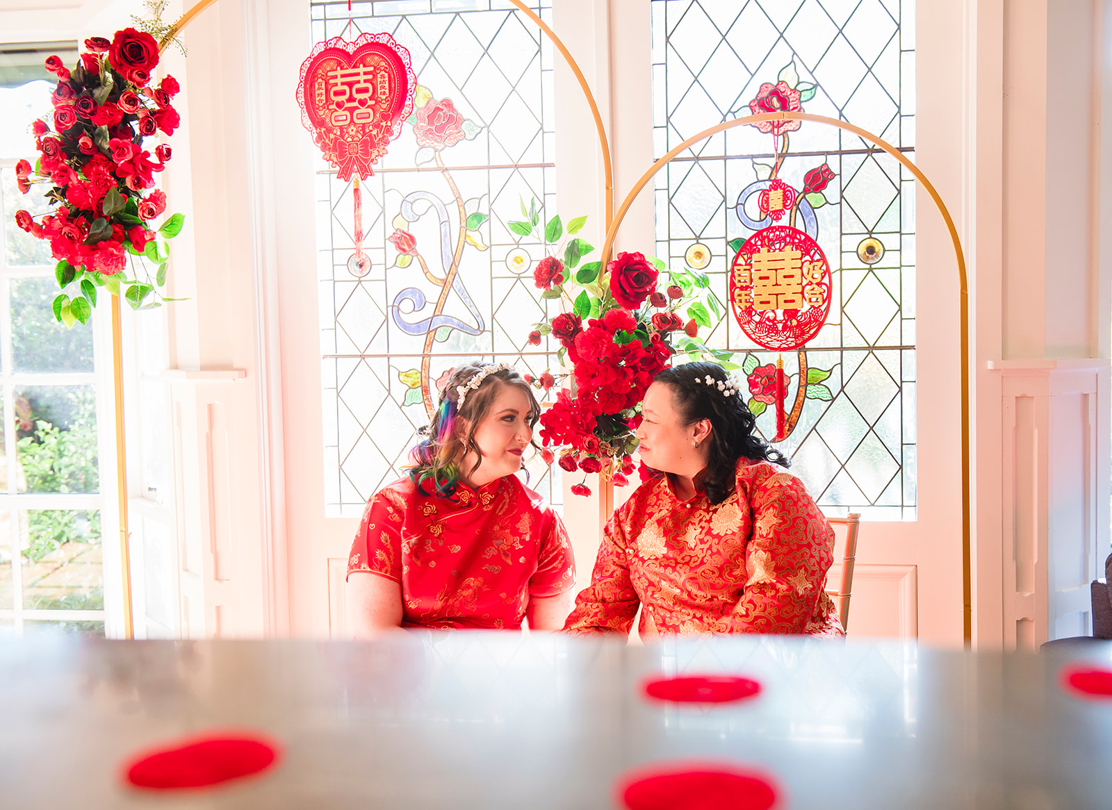 Brides during tea ceremony at Elizabethan Lodge